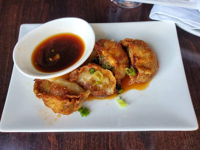 Chaplin's Restaurant & Bar signature dishes Chaplin A.S.S. Ramen, Miso Ramen, Pork Belly Buns, Crispy Dumplings